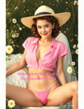 Woman in a pink outfit sitting outdoors with flowers around with nude version 2 included